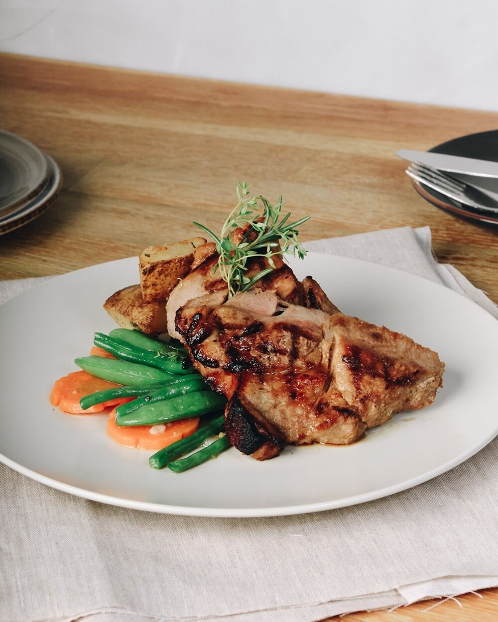 Best enjoyed medium, this glorious Nagano Miso Pork is perfectly tender, juicy and aromatic. Accompanied with roasted potatoes, seasonal vegetables and our housemade raspberry sauce.